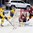 COLOGNE, GERMANY - MAY 11: Sweden's Elias Lindholm #28 looks for a scoring chance against Latvia's Elvis Merzlikins #30 while Arturs Kulda #32 defends during preliminary round action at the 2017 IIHF Ice Hockey World Championship. (Photo by Andre Ringuette/HHOF-IIHF Images)

